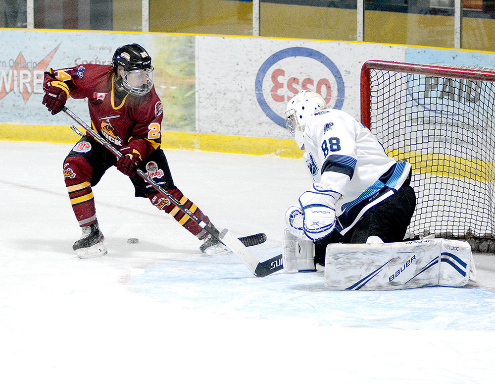 Timmins Rock forward Nicolas Pigeon’s attempts to pounce on a juicy rebound were foiled on this second-period play as the puck bounced between his legs after Crunch goalie Michael Nickolau made the initial save Friday night at the Tim Horton Event Centre in Cochrane. Pigeon would have the last laugh, however, as he netted his first NOJHL goal in the third period to help the Rock skate to a 6-2 victory. The two teams will play the second game of their 10-game set at the Tim Horton Event Centre Saturday night. THOMAS PERRY/THE DAILY PRESS
